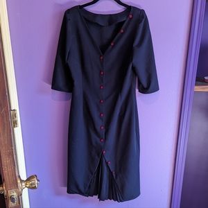 Navy blue dress with red buttons